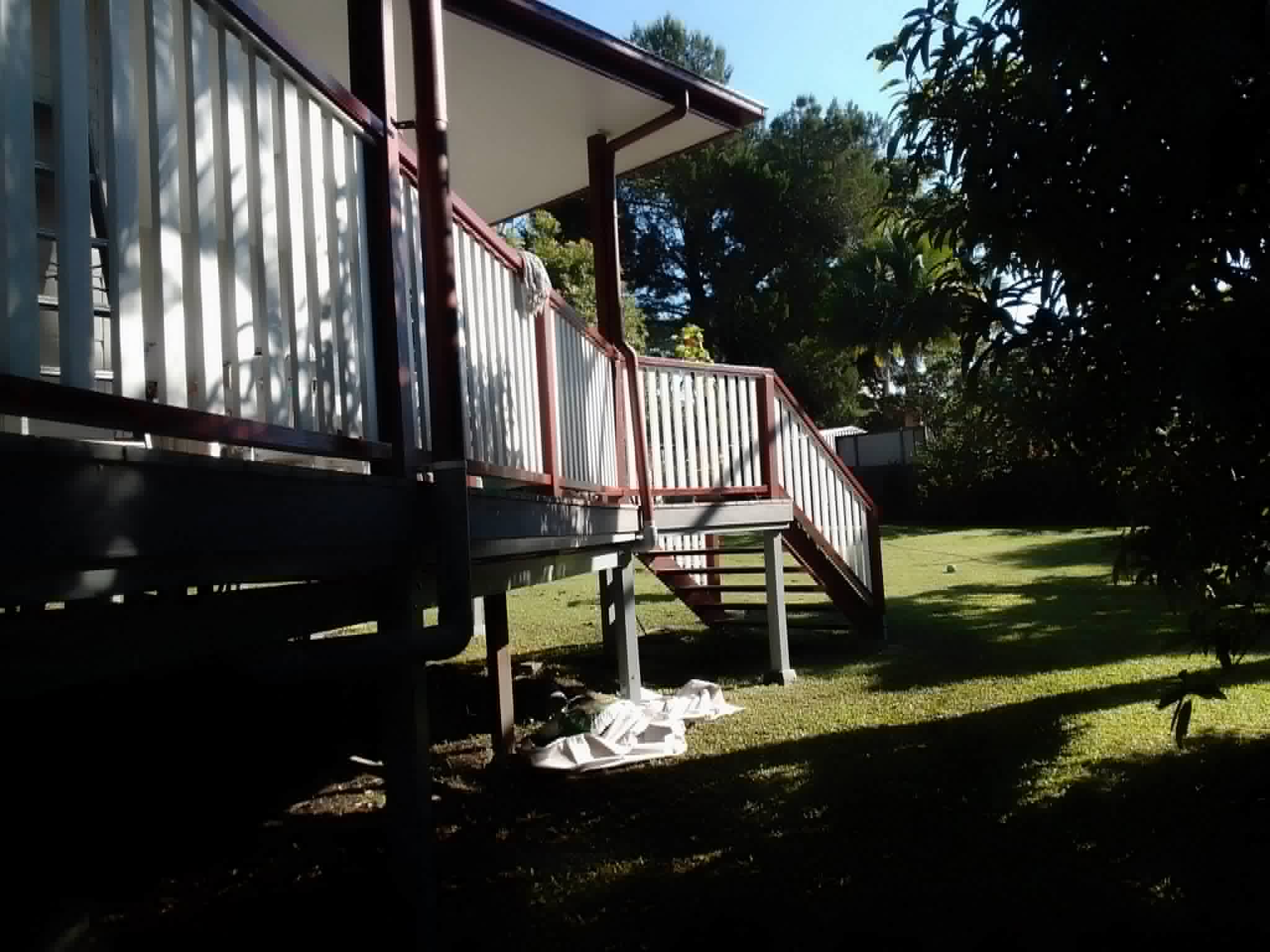 Mould biocide treatment and cladding restoration in damp hinterland valley